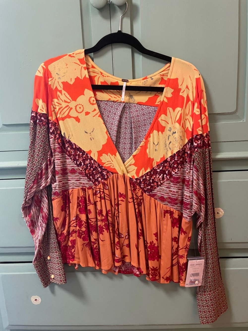 Free People Mixed-Print V-Neck Patchwork Blouse in Orange and Peach